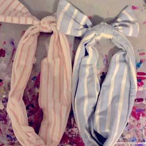 Two striped, like-new headbands, one size fits most.